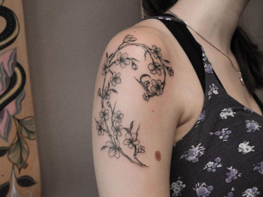 21. A cherry blossom Fibonacci tattoo 