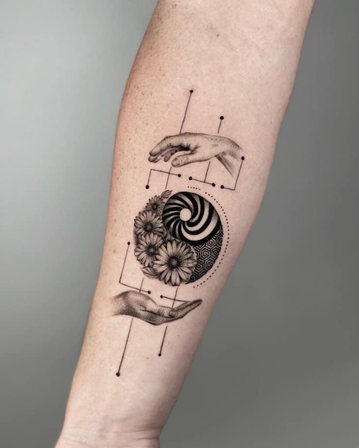 5. A Fibonacci tattoo with flowers and geometric shapes
