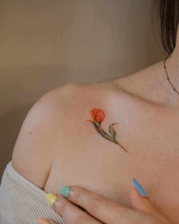 17. A tulip tattoo on the collarbone
