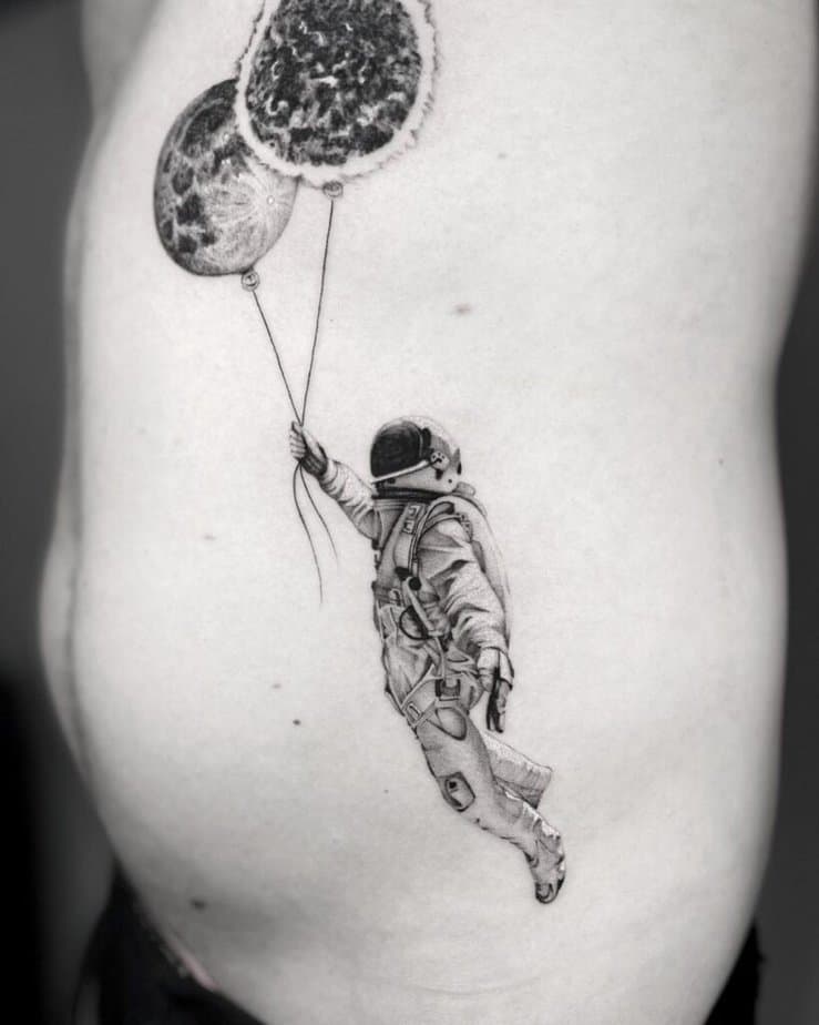 Astronaut tattoos that sit on your stomach