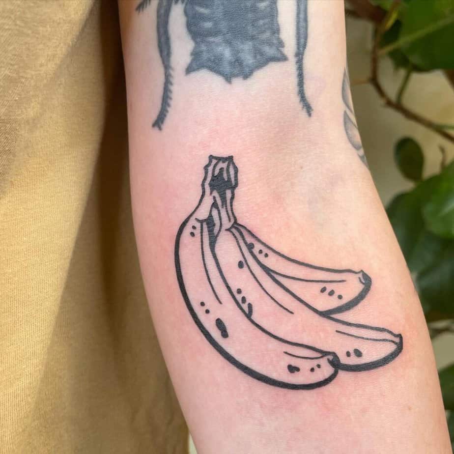2. A blackwork banana tattoo