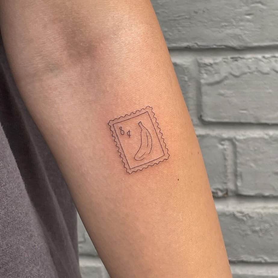 21. A banana stamp tattoo 
