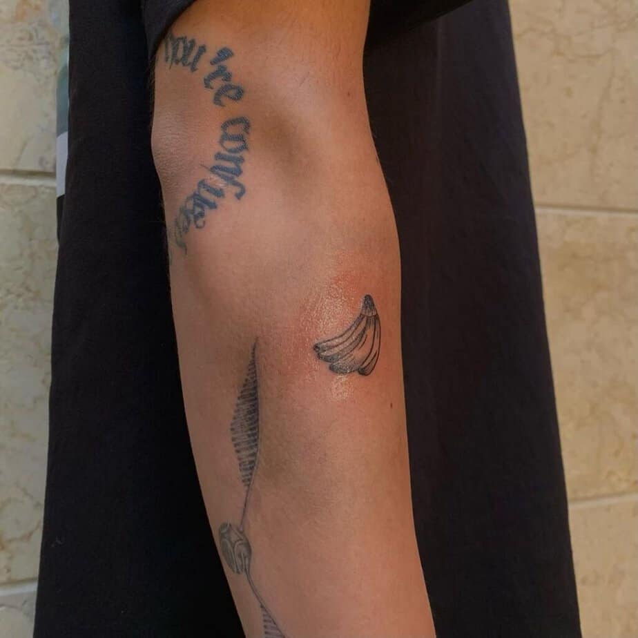3. A banana sticker sleeve tattoo