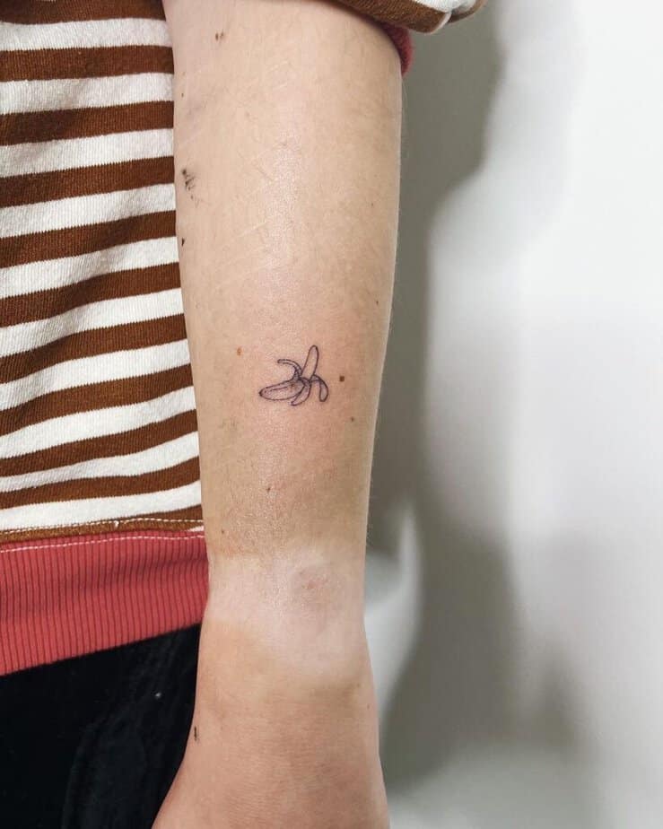 6. A single-needle banana tattoo