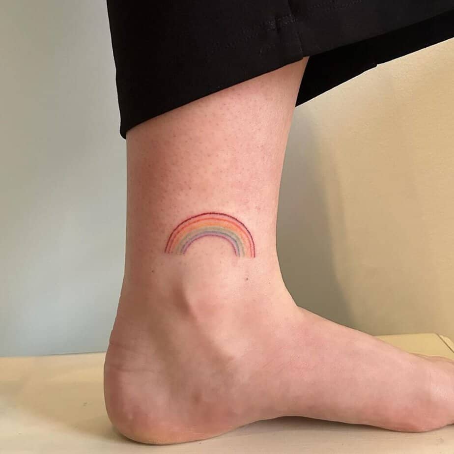 20. A tattoo of a rainbow on the ankle