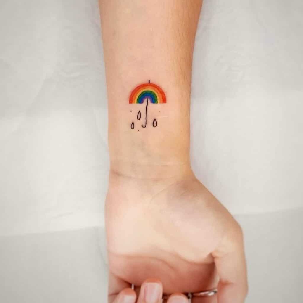 22. A tattoo of a rainbow umbrella 