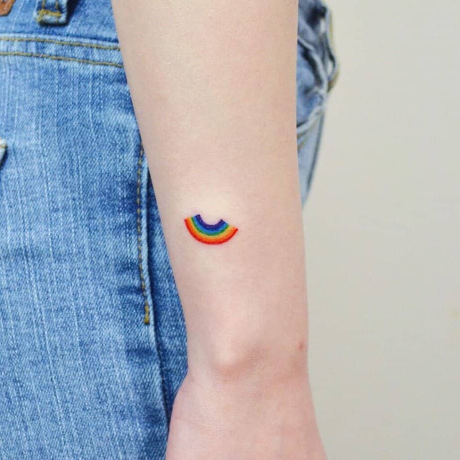 3. A rainbow tattoo on the wrist
