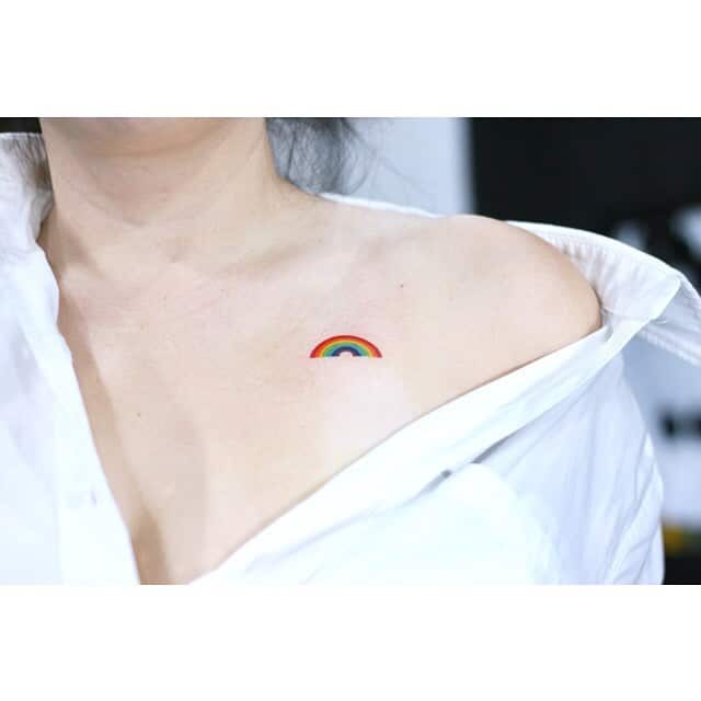 8. A rainbow tattoo on the collarbone