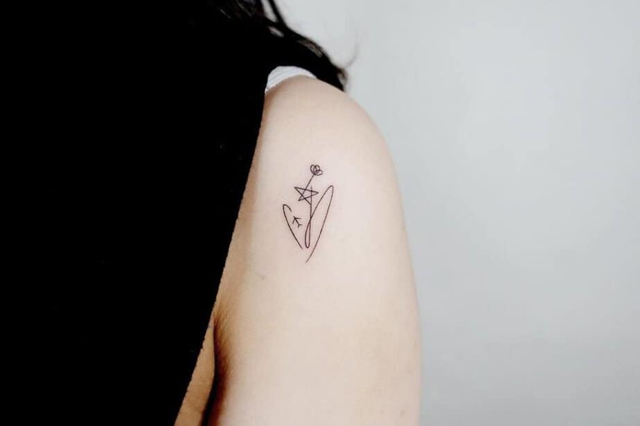 17. Un tatuaggio astratto di una stella cadente