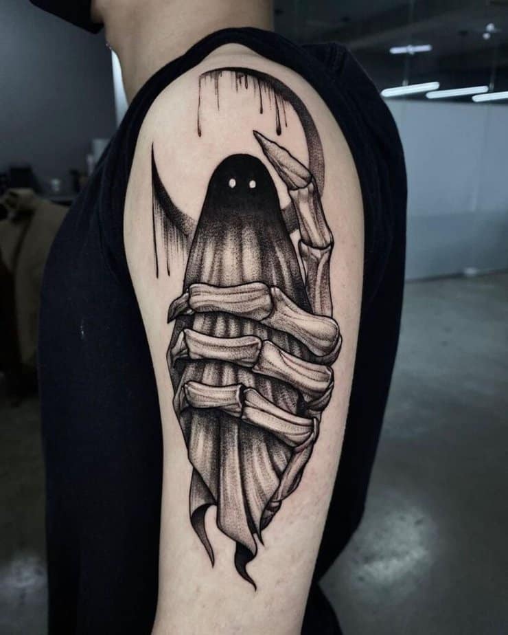 Tatuaggio gotico con scheletro sulla mano