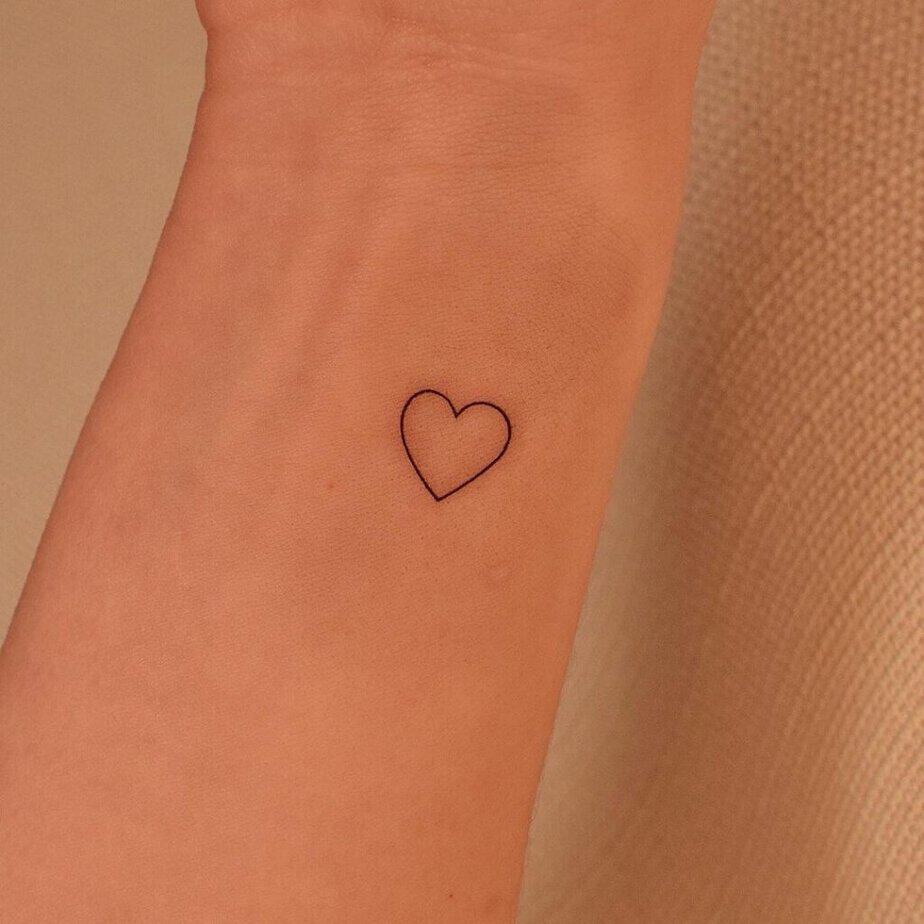 7. A heart tattoo on the wrist
