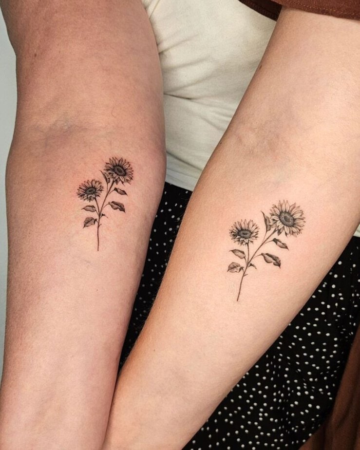 12. A matching mother and daughter sunflower tattoo 