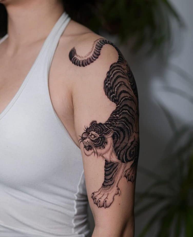 6. A tiger on the upper arm