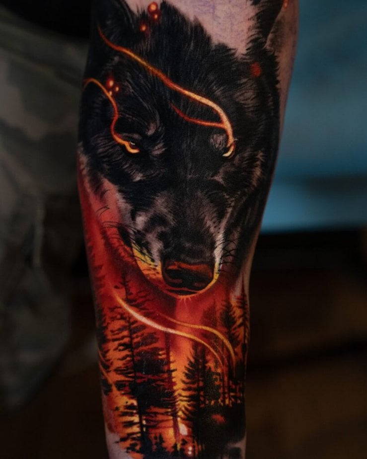 Tatuaggi colorati da uomo con il lupo