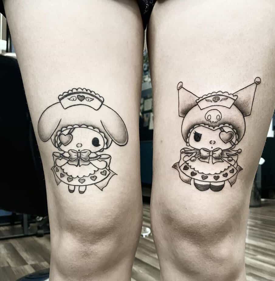 Anime or cartoon above-knee tattoo