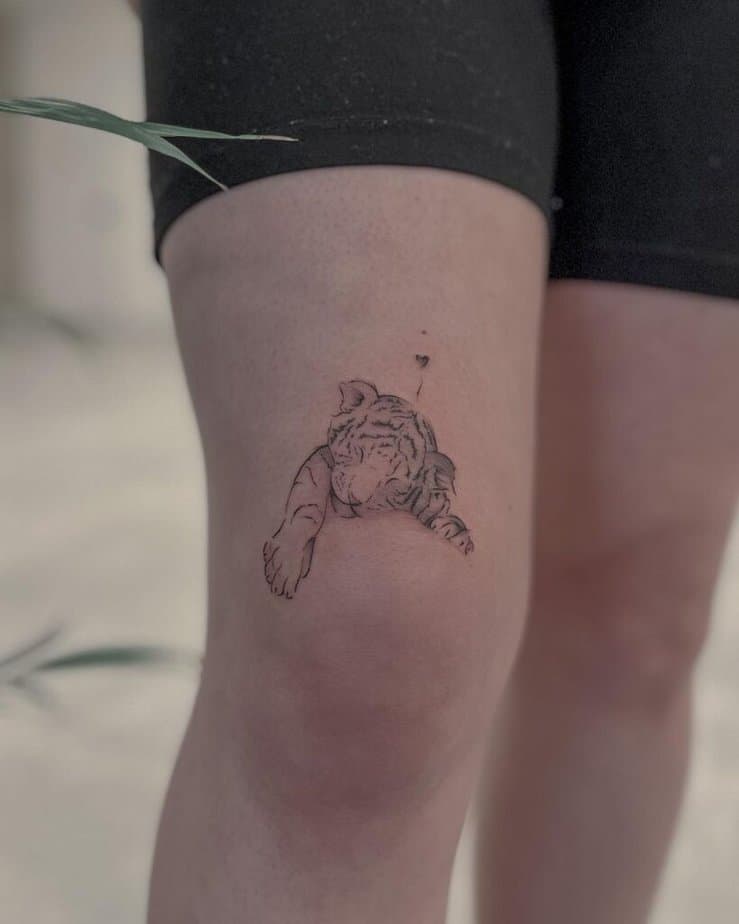 Unusual above-knee tattoo designs