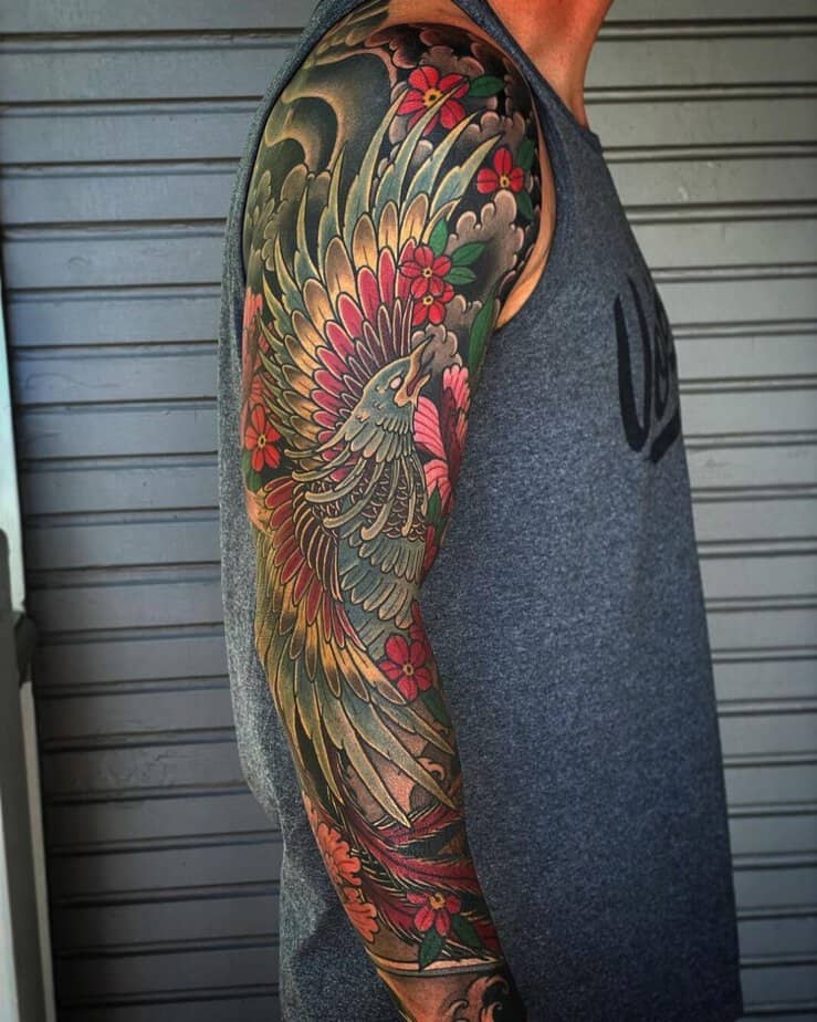 The whole arm covered by a powerful phoenix