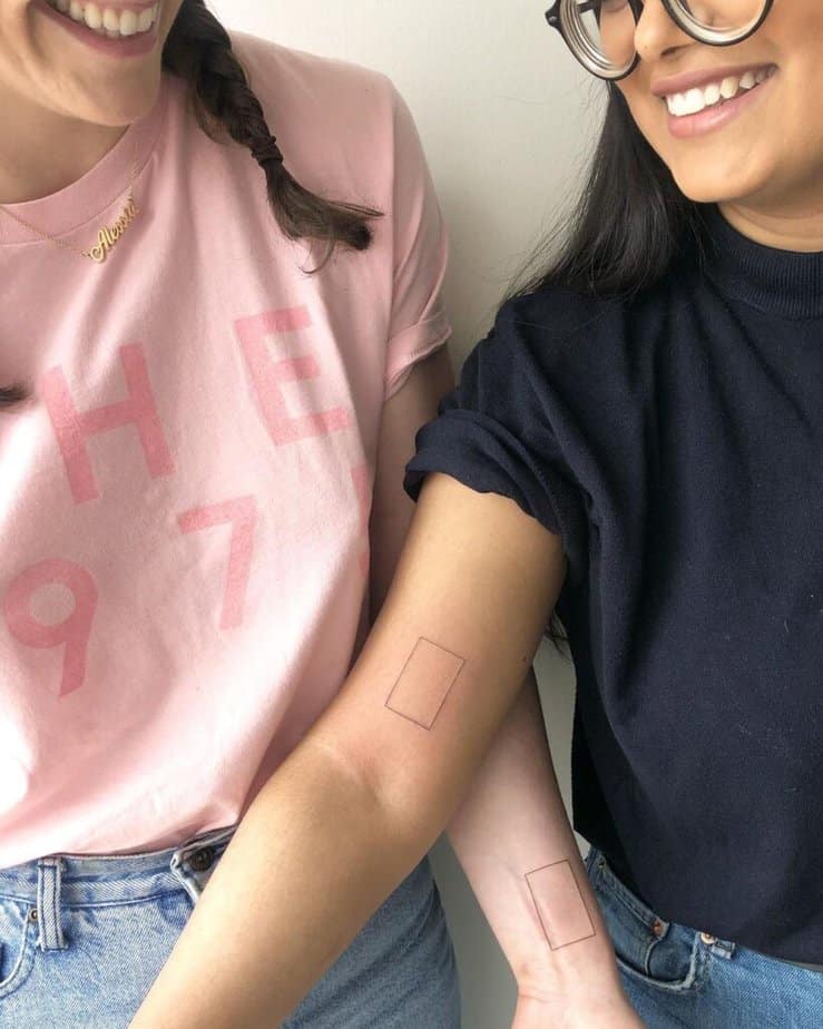 20. Best friend tattoos of matching symbols 