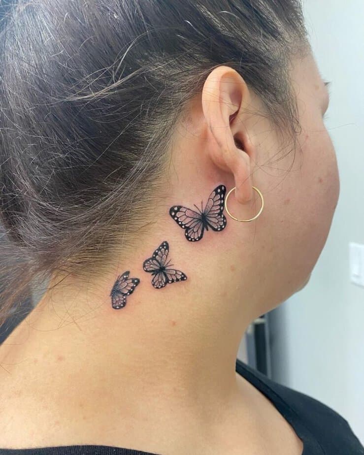 10. A tattoo of black-and-white butterflies 