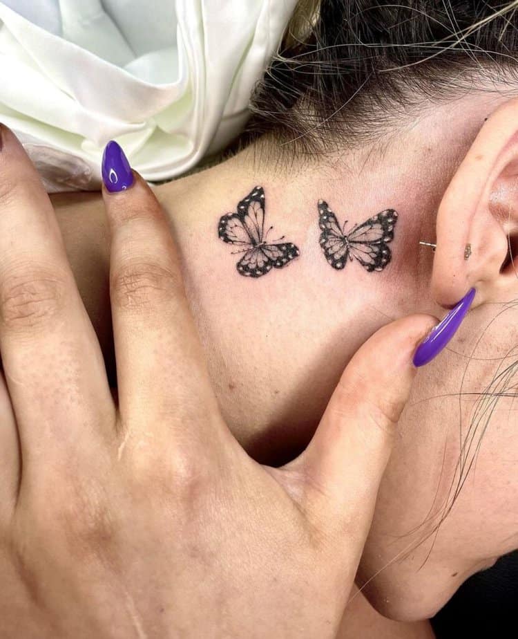 11. A simple and sleek butterfly tattoo 