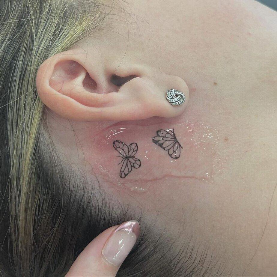 13. Un tatuaggio a forma di farfalla delicato e grazioso 