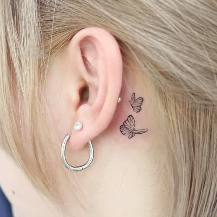 23. A tattoo of a whispering butterfly 