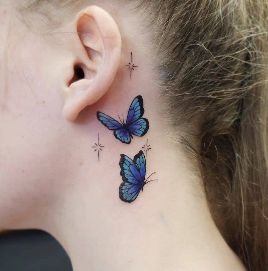 3. A tattoo of two blue butterflies 