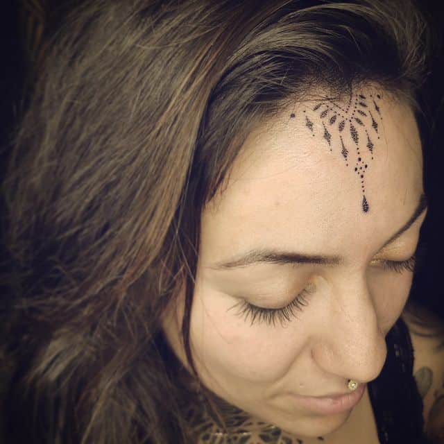 14. Outstanding forehead tattoo