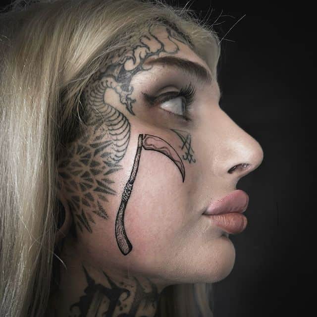 16. Interesting face tattoo idea
