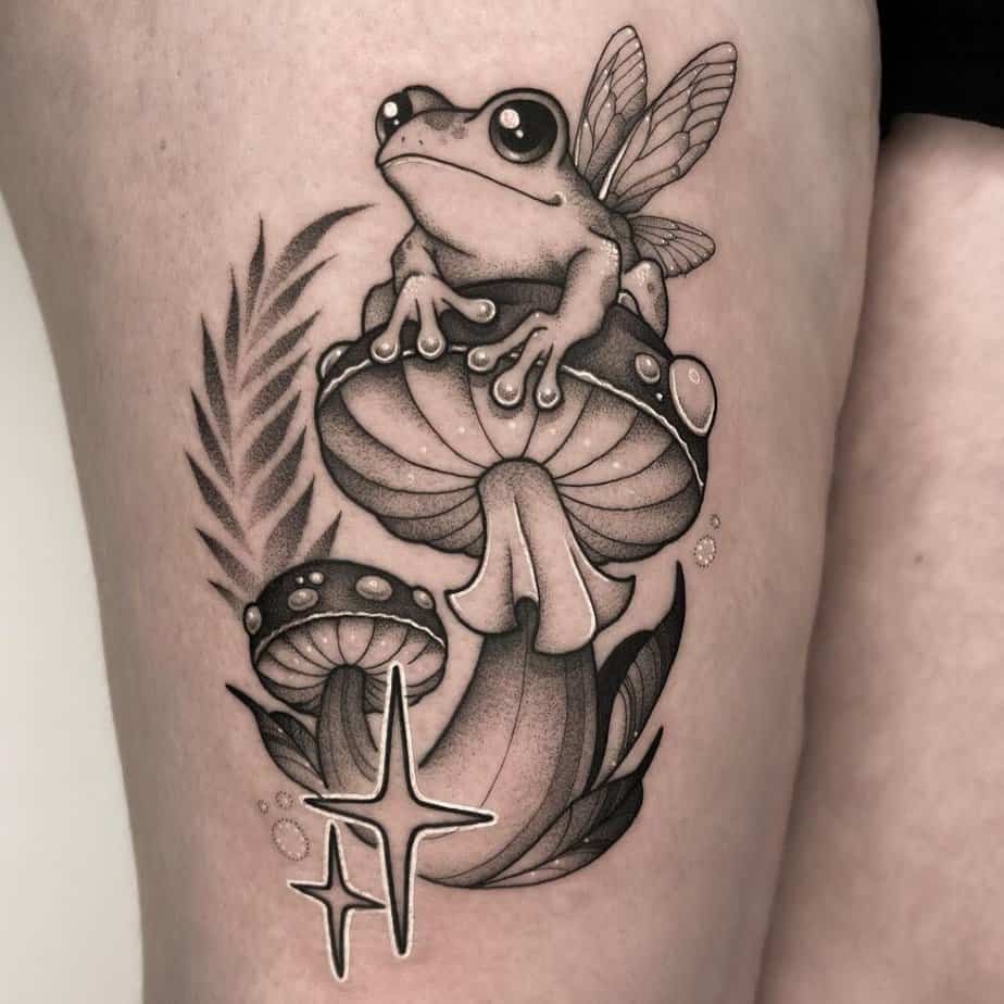 Black and gray frog tattoo
