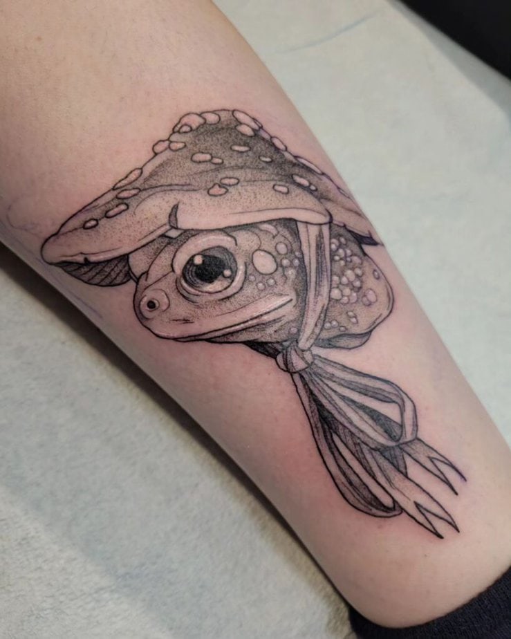 Black and gray frog tattoo