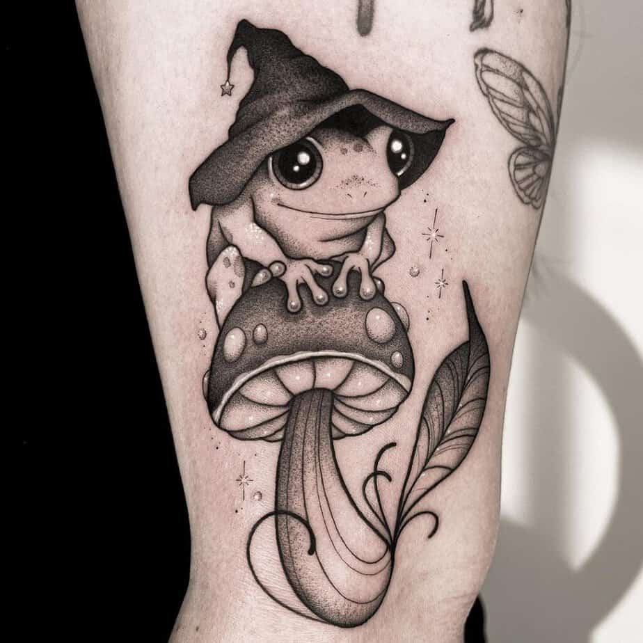 Witchy frog tattoo