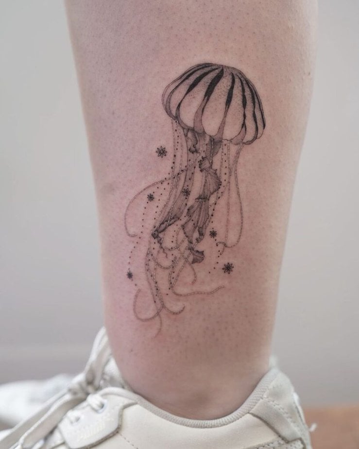 12. A jellyfish tattoo on the ankle