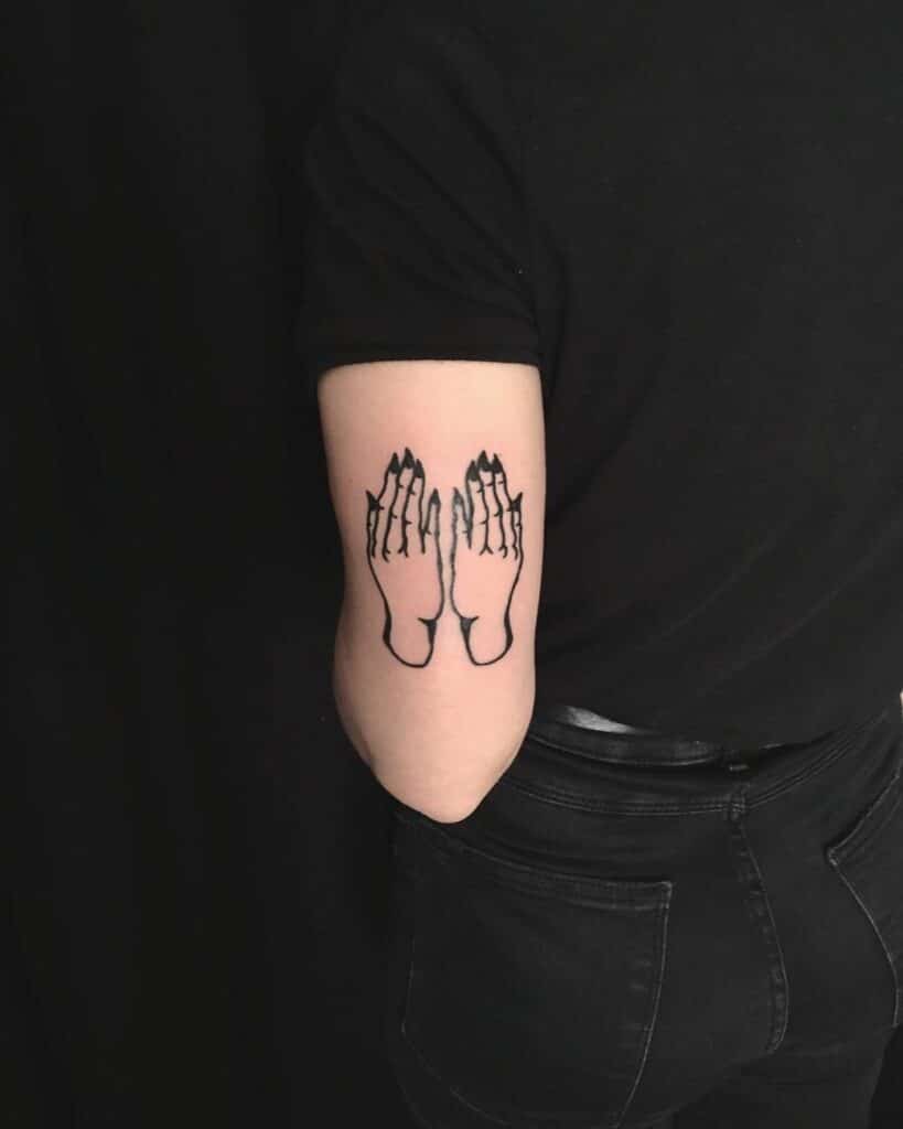 Simple witch hands tattoo