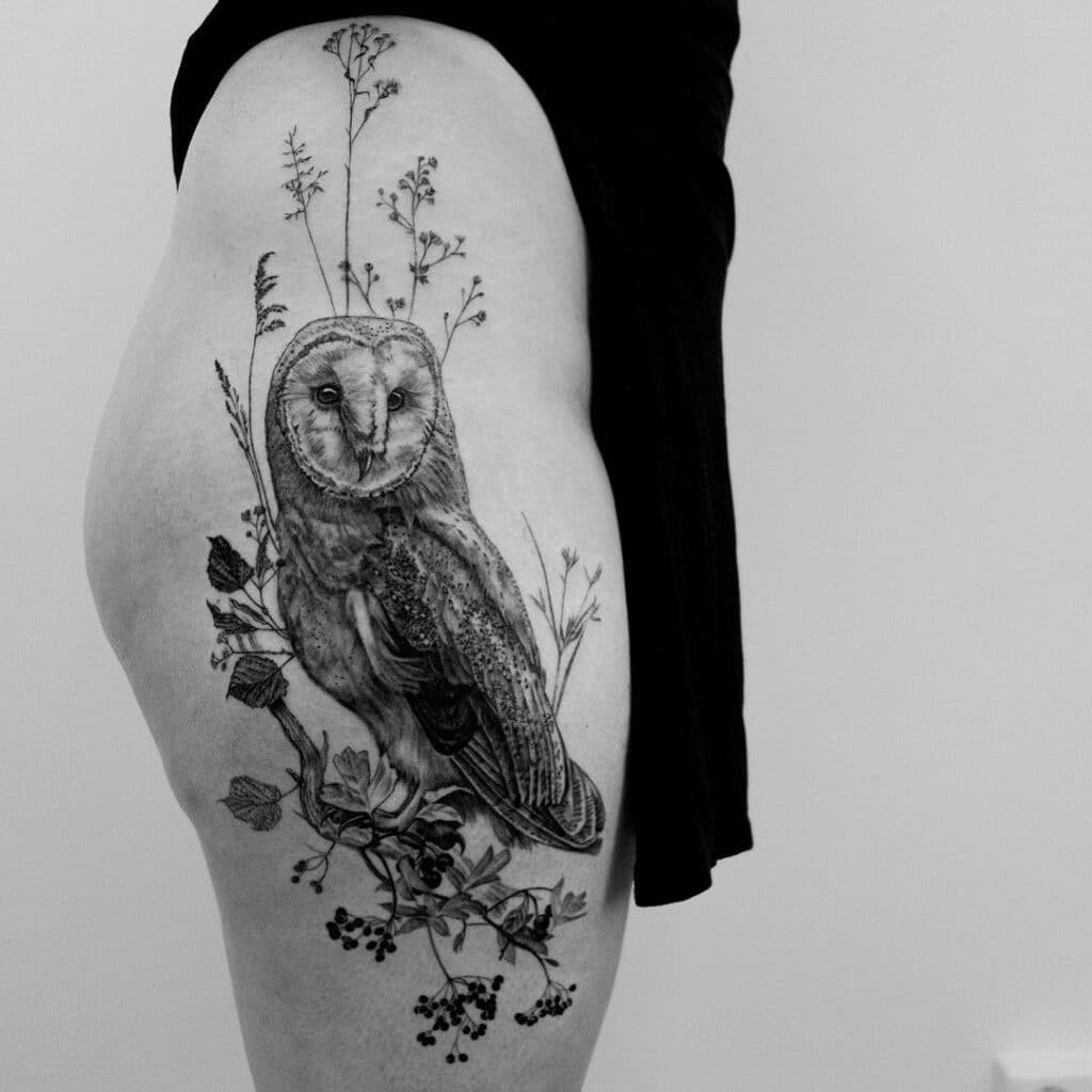 Floral and owl tattoos