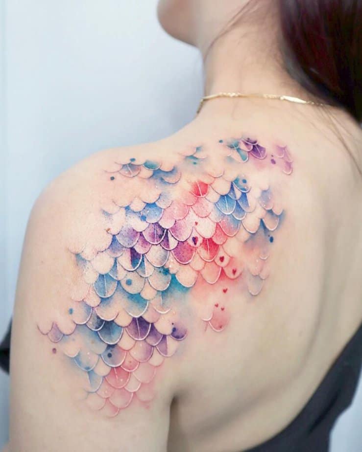23. A tattoo of mermaid scales on the shoulder 