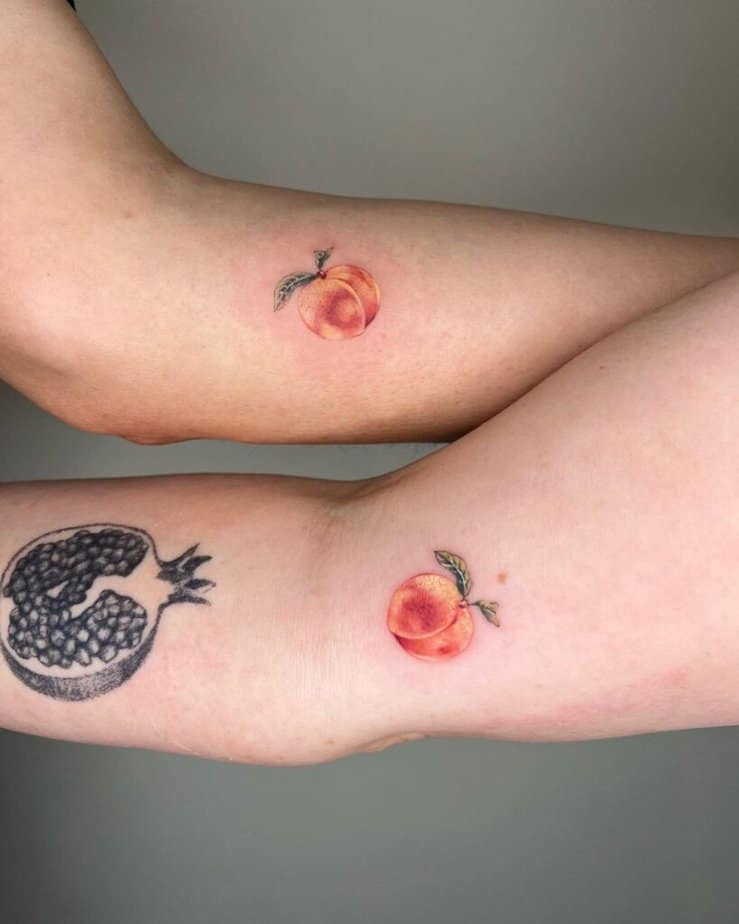 11. A matching peach tattoo