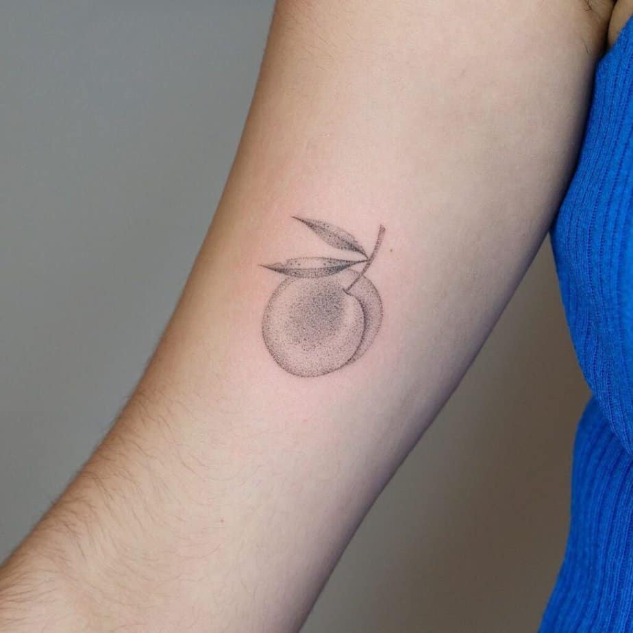 2. A dotwork peach tattoo 