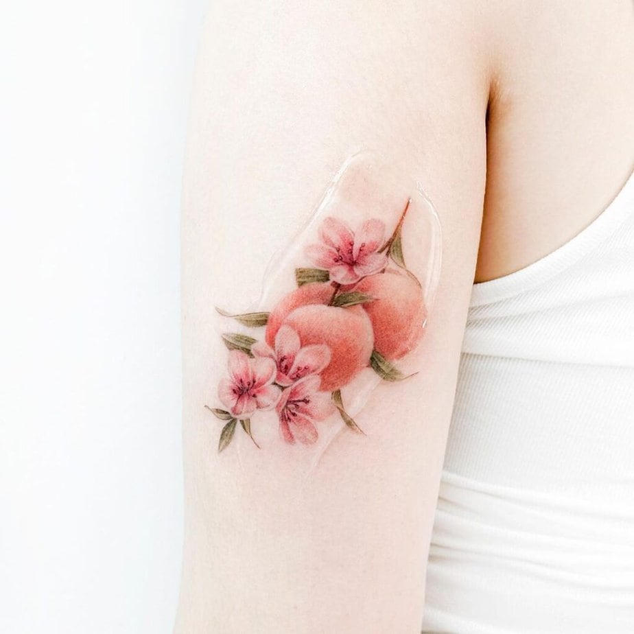 21. A soft and subtle peach tattoo 