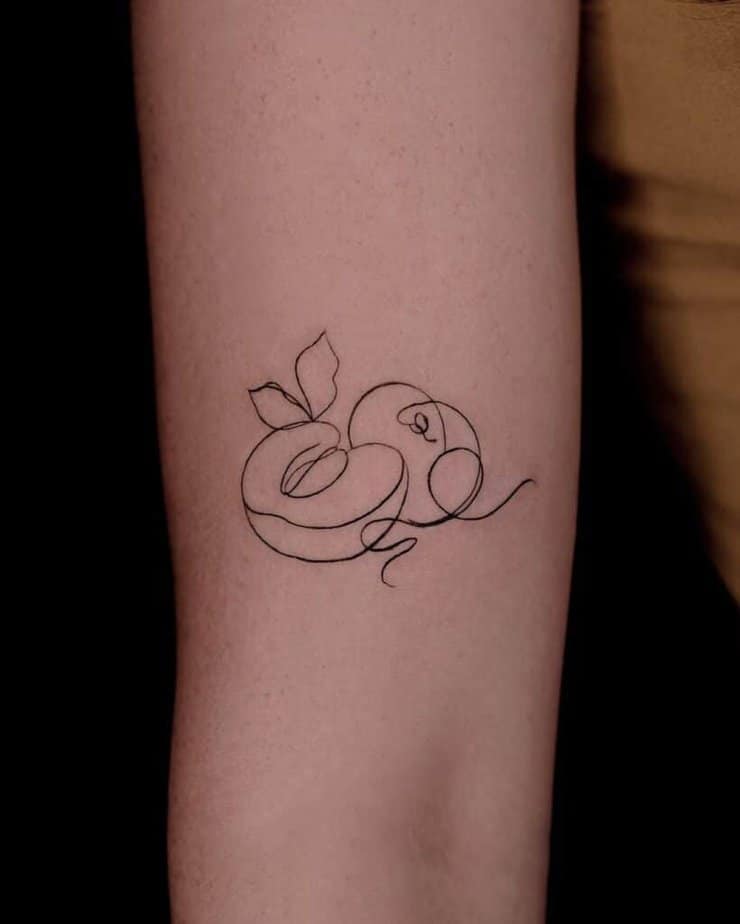 24. An abstract peach tattoo 