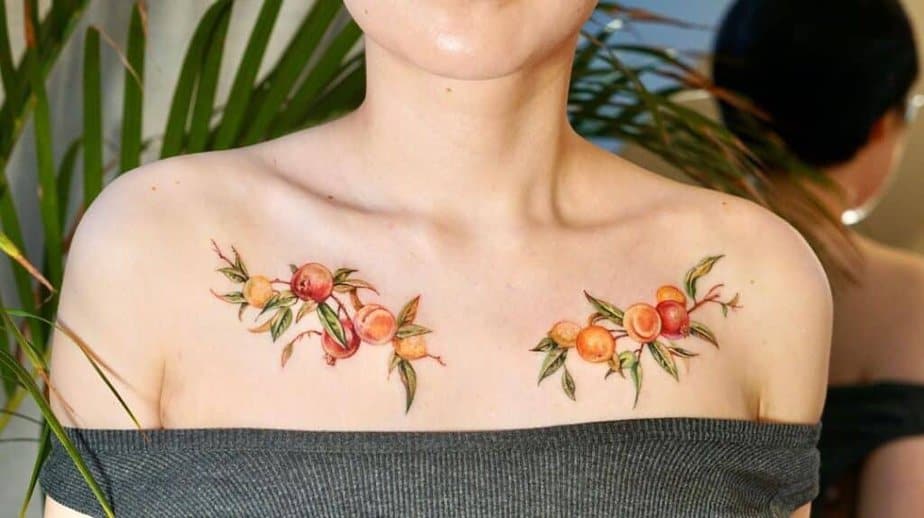 8. A peach branch tattoo on the collarbone 