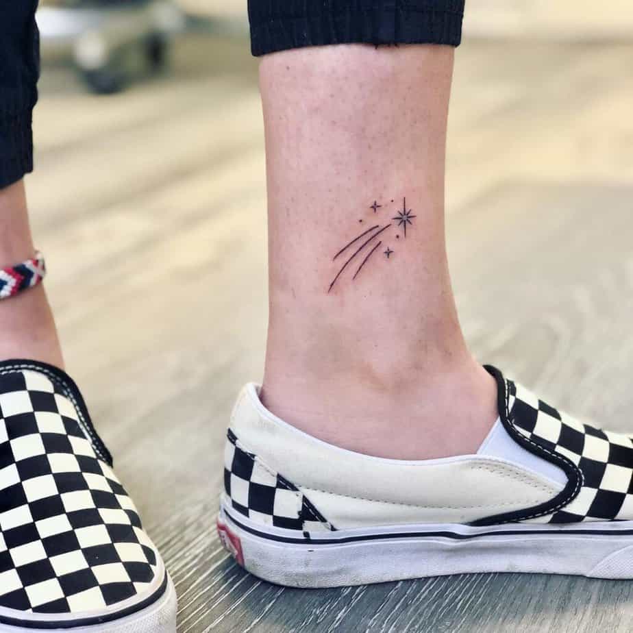 14. A shooting star ankle tattoo 
