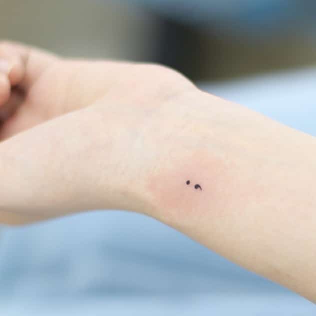23. A semicolon tattoo 