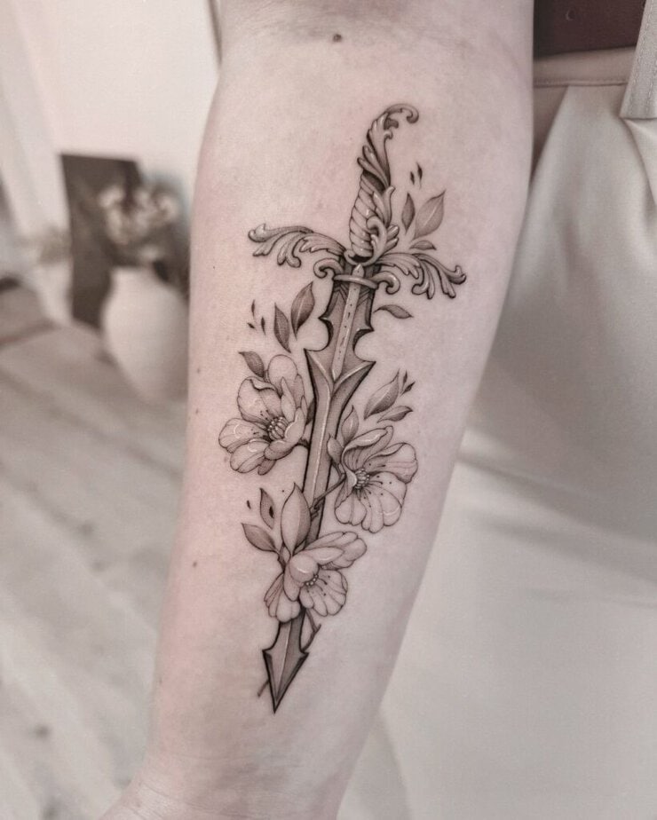 Fantasy dagger tattoo