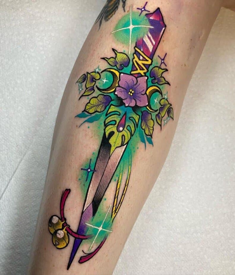 Feminine dagger tattoos