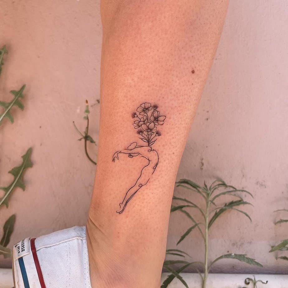 1. A floral line art tattoo
