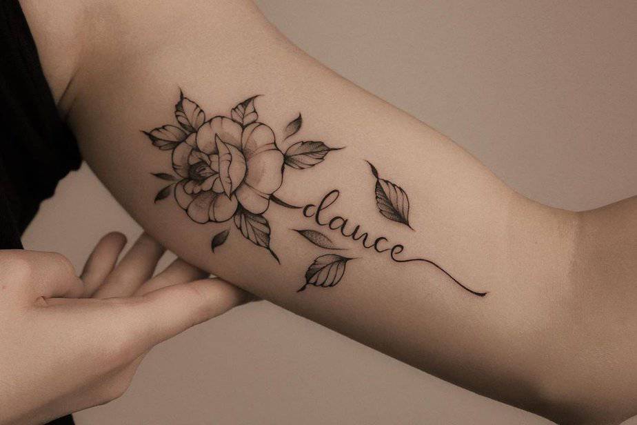 21. A tattoo of the word “dance”
