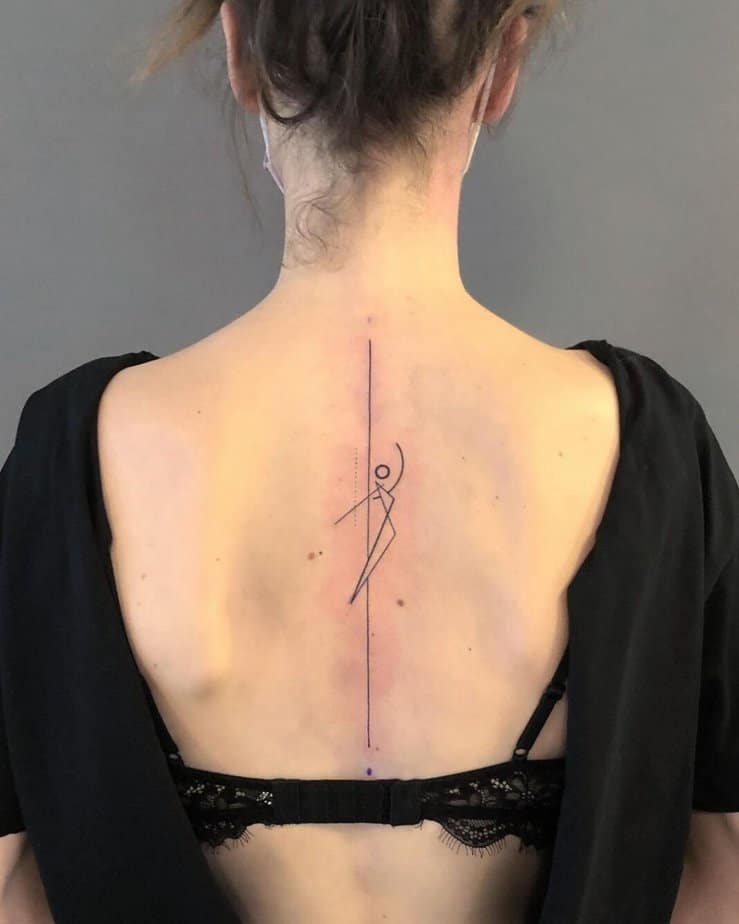 7. A geometric tattoo of a dancer
