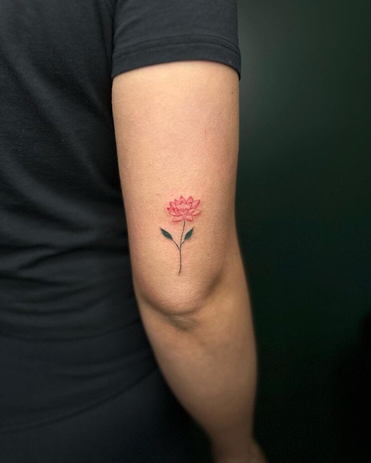 24. A delicate and dainty water lily tattoo  