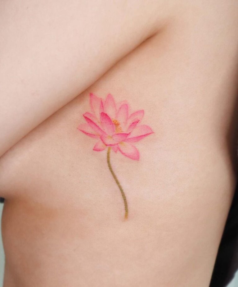 25. A water lily ribcage tattoo